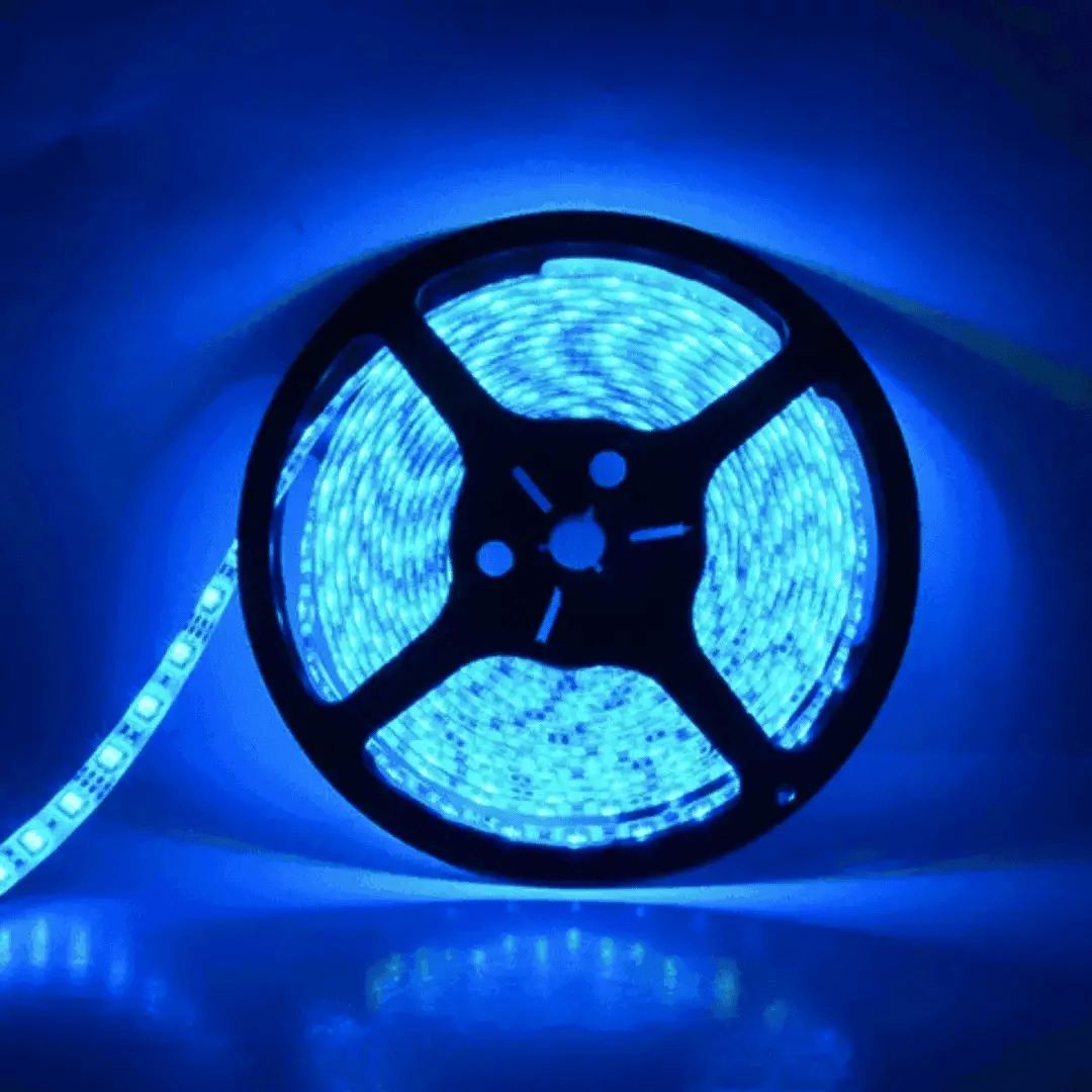 Roll of blue LED strip light on a dark background